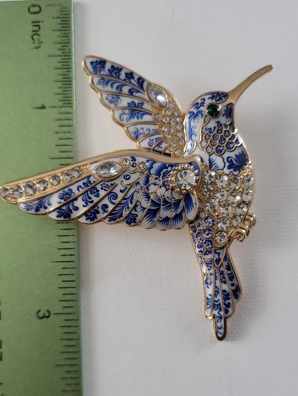 Elegant Blue & Gold Hummingbird Brooch - Ornate Crystal Accent